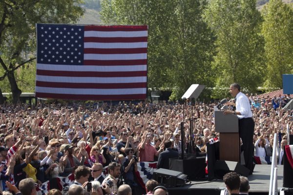 Golden, Colorado, U.S.A. - September 13, 2012: In Golden's Lions Park, a large and diverse crowd of people has gathered to listen, applause and cheer President Barack Obama who speaks about his plans for the future.